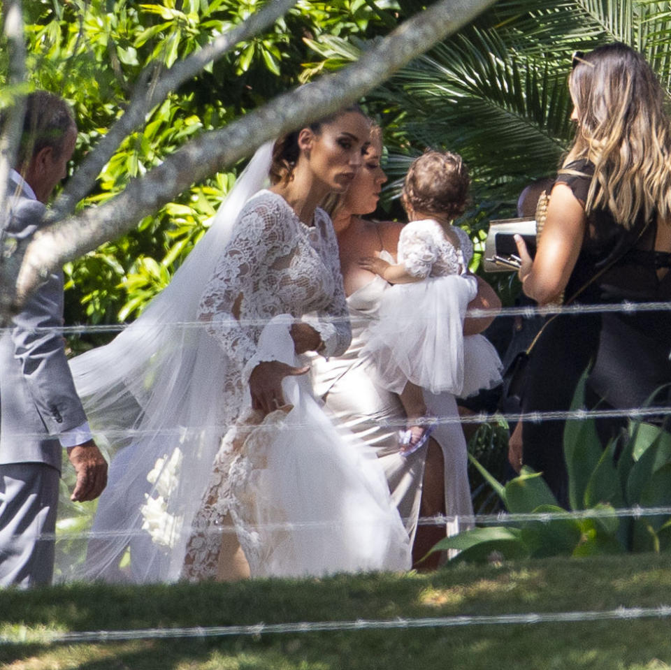 The beautiful bride stepped out in a white lace long-sleeve gown Source: Media Mode