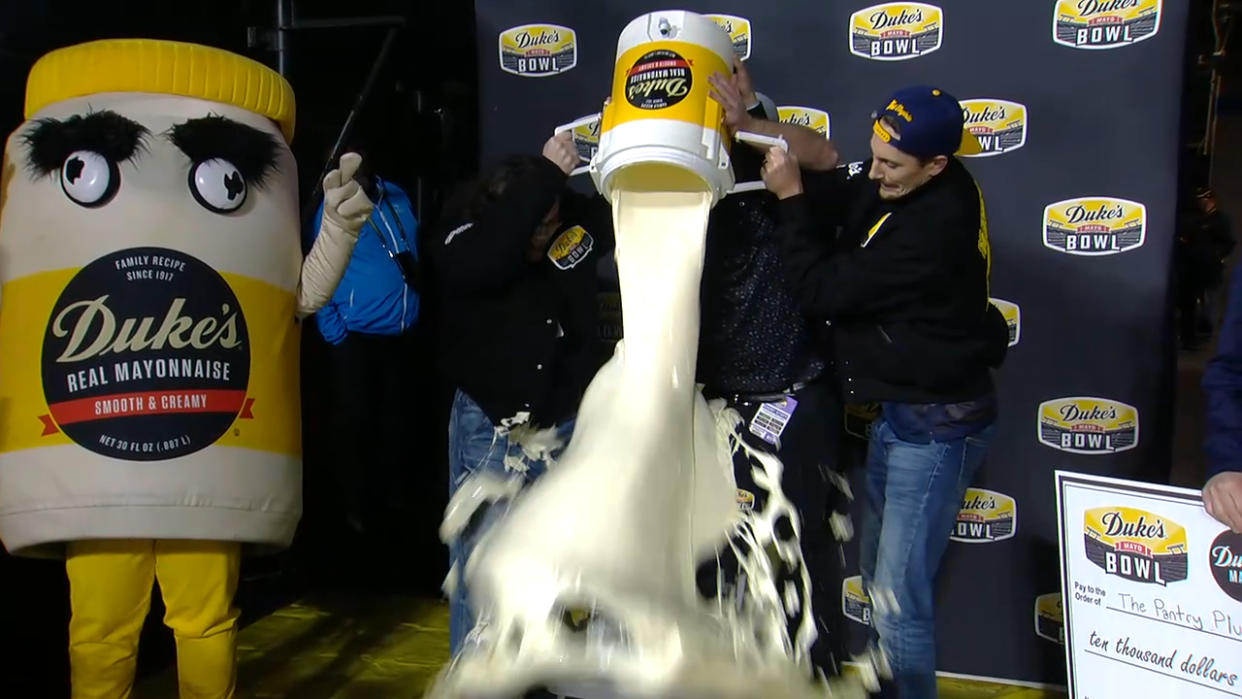 West Virginia coach Neal Brown got a mayonnaise bath after his team won the Duke's Mayo Bowl. (via ESPN)