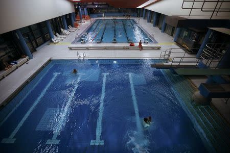 General view of the inside of a public indoor swimming pool in the western German town of Bornheim, Germany, January 16, 2016. REUTERS/Wolfgang Rattay