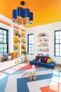 <p>While the rest of your home may follow a neutral color palette, the playroom is a space meant to inspire creativity. From the bright ceiling to the geometric area rug, this room exudes color from floor to ceiling. </p><p>"Infuse your space with color and interest to inspire your kiddos," says Anne Gillyard of <a href="https://www.grohplayrooms.com/" rel="nofollow noopener" target="_blank" data-ylk="slk:grOH! Playrooms" class="link ">grOH! Playrooms</a>. "A visually inviting environment enhances play exponentially for the whole family."<br></p>