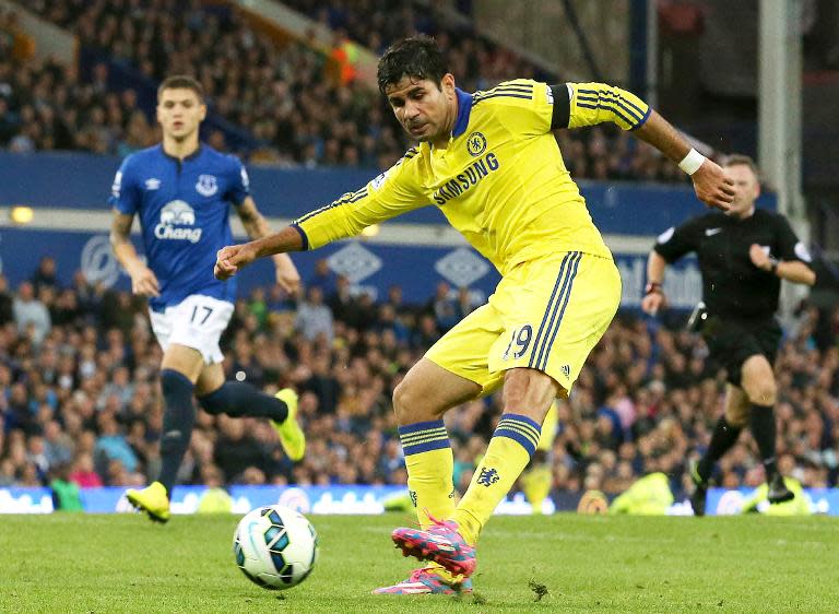 Striker Diego Costa scores Chelsea's sixth goal during the Premier League match against Everton at Goodison Park on August 30, 2014