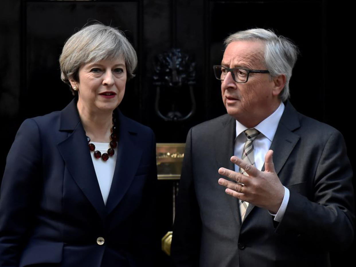 Theresa May welcomes Jean-Claude Juncker to Downing Street: Reuters