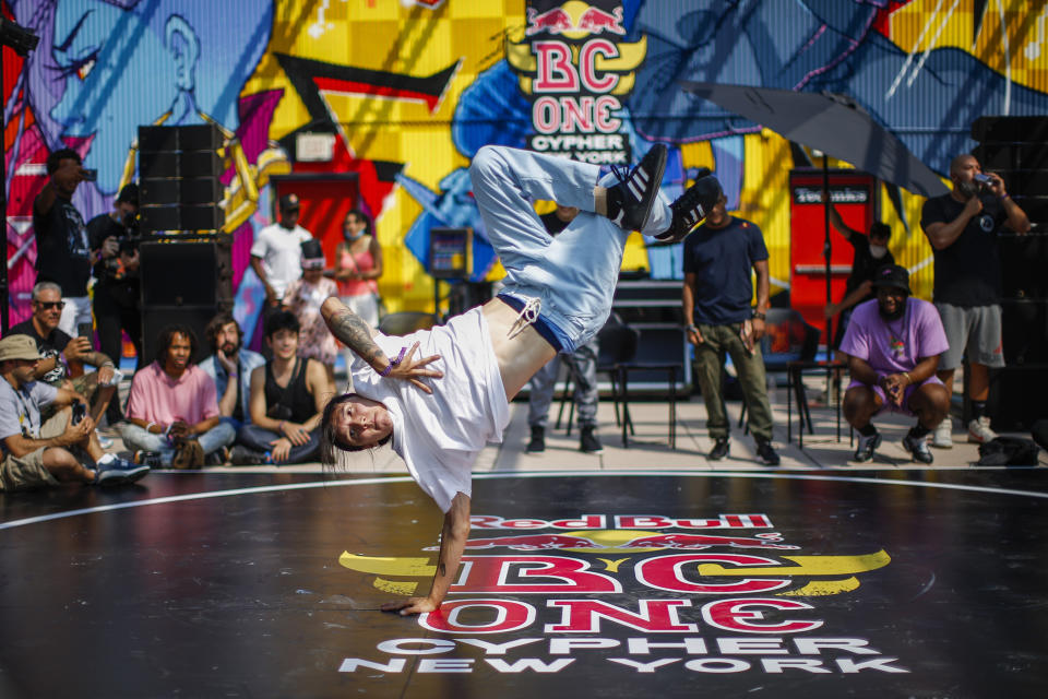 An attendee dances on the floor before the Red Bull BC One event on, Saturday, July 24, 2021. in New York. Many in the breaking community are eager for the art form to expand its audience after the International Olympic Committee announced that it would become an official sport at the Paris 2024 games. But that optimism is hardly unanimous. (AP Photo/Eduardo Munoz Alvarez)