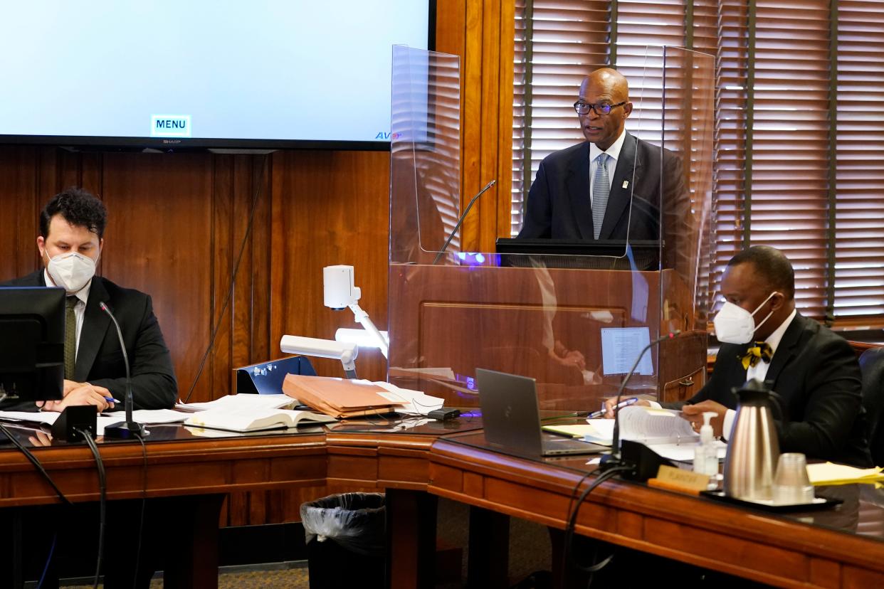 Attorney Terry Clayton, center, speaks during a hearing in Davidson County Chancery Court on Wednesday, April 6, 2022, in Nashville, Tenn. Clayton is representing town leaders of Mason, Tenn., a small town facing a takeover of its finances by the state comptroller. At left is attorney JP Urban of the Tennessee Attorney General's office, and at right is Van Turner Jr., who is also representing town leaders of Mason.