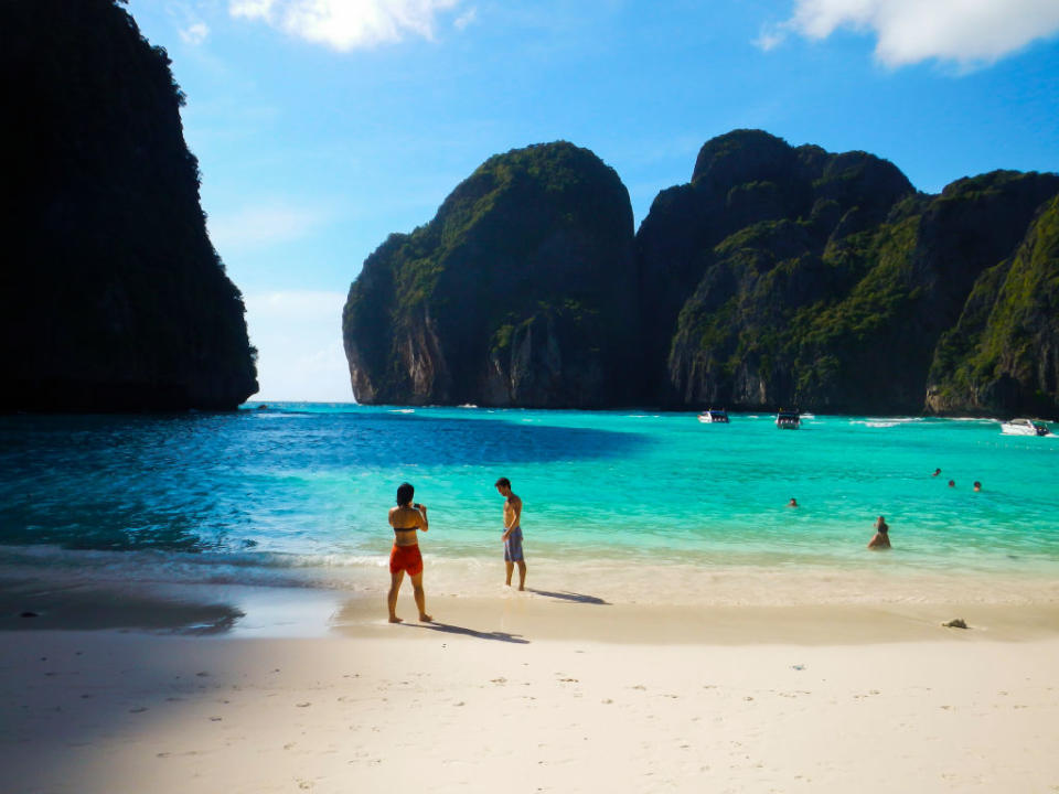 Tourists in Maya Bay. Phi Phi Leh island. Krabi province, Andaman Sea, Thailand.