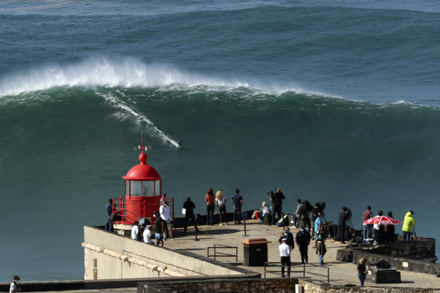 Hurricane-generated swell draws big wave surfers to Portugal's Nazare