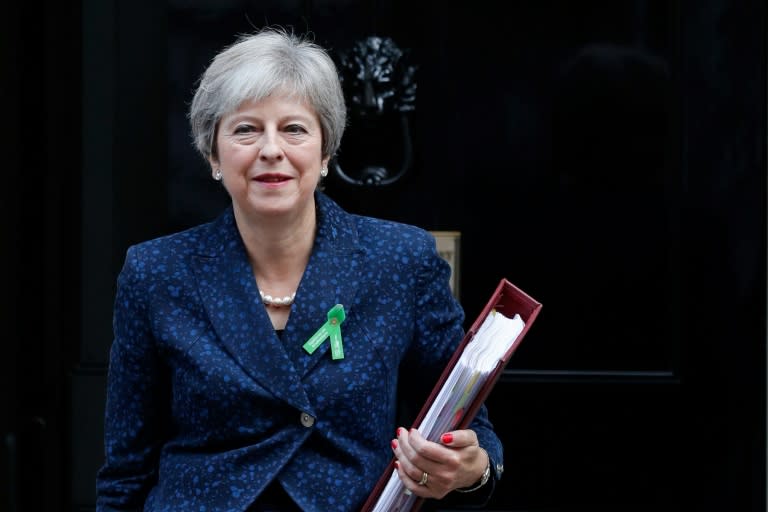 Theresa May leaves 10 Downing Street in London on October 10, 2018 ahead of the weekly Prime Minister's Questions (PMQs) session in the House of Commons