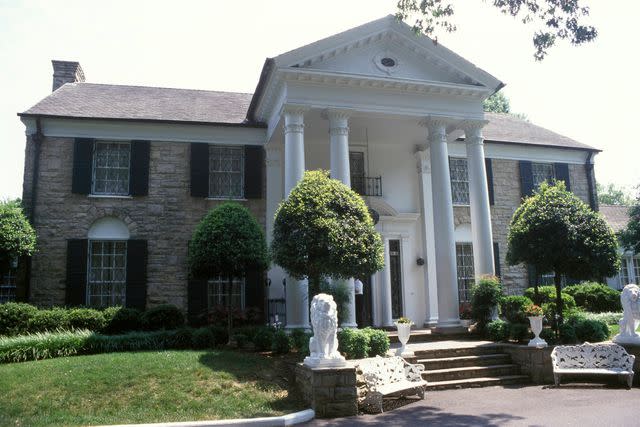 <p>Mick Hutson/Redferns</p> Circa 1970: Photo of Elvis PRESLEY and VENUES and GRACELAND; Elvis Presley's house, Graceland