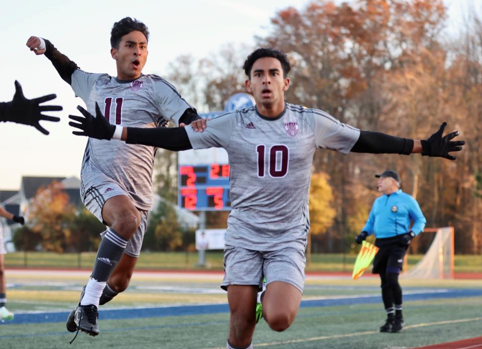 Caravel's Zayd (10) and Zain Akhtar celebrate a goal during their 4-0 win over Saint Mark's in the DIAA Division II Boys Soccer championship game on Saturday at Dover High.