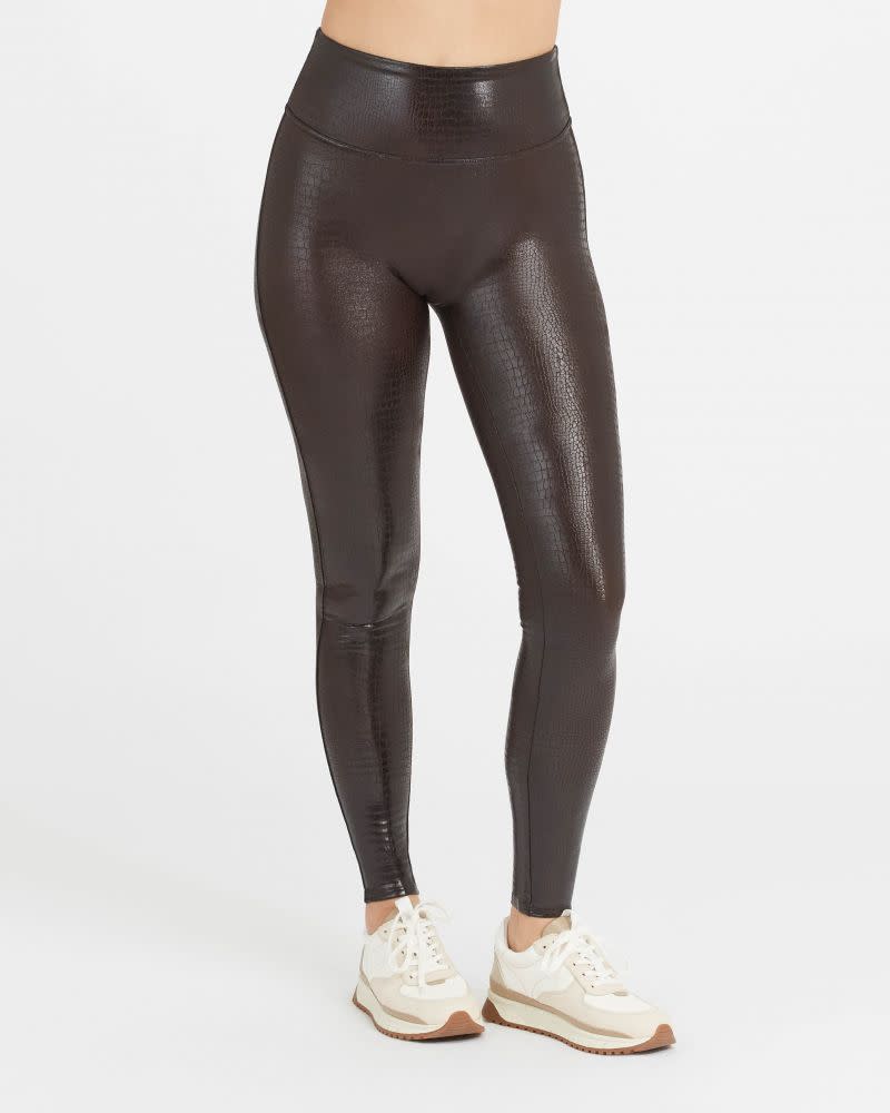 Faux Leather Croc Shine Leggings in black/brown. Image via Spanx.