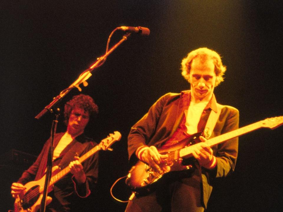John Illsley and Mark Knopfler playing a Dire Straits gig in 1979 (Andre Csillag/Shutterstock)