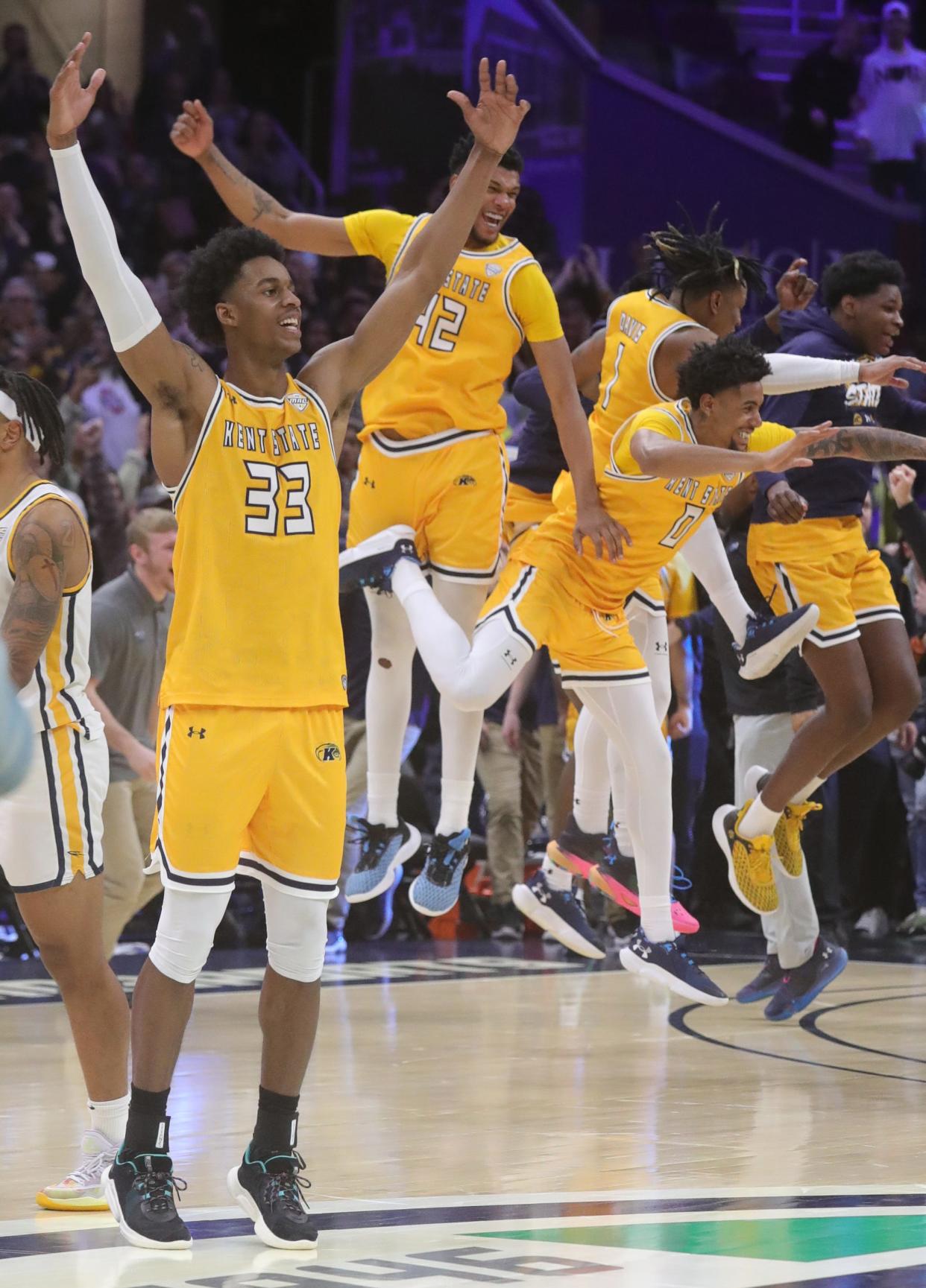 Kent State celebrates its win over Toledo in the MAC Tournament championship game March 11, 2023, in Cleveland.