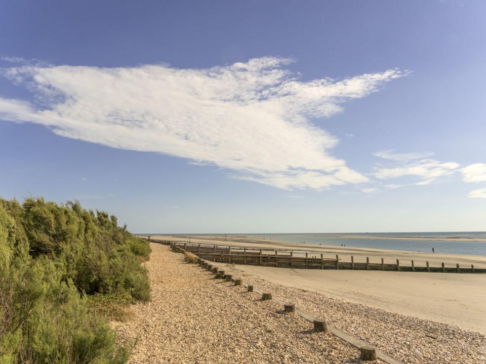 <p>West Wittering is a long and narrow beach with an open stretch of sand, backing onto Solent and Chichester harbour. Its popular with windsurfers and swimmers, and at low tide there are pools for paddling. Beautiful! </p><p><a class="link " href="https://www.airbnb.co.uk/" rel="nofollow noopener" target="_blank" data-ylk="slk:FIND AN AIRBNB;elm:context_link;itc:0;sec:content-canvas">FIND AN AIRBNB</a></p>