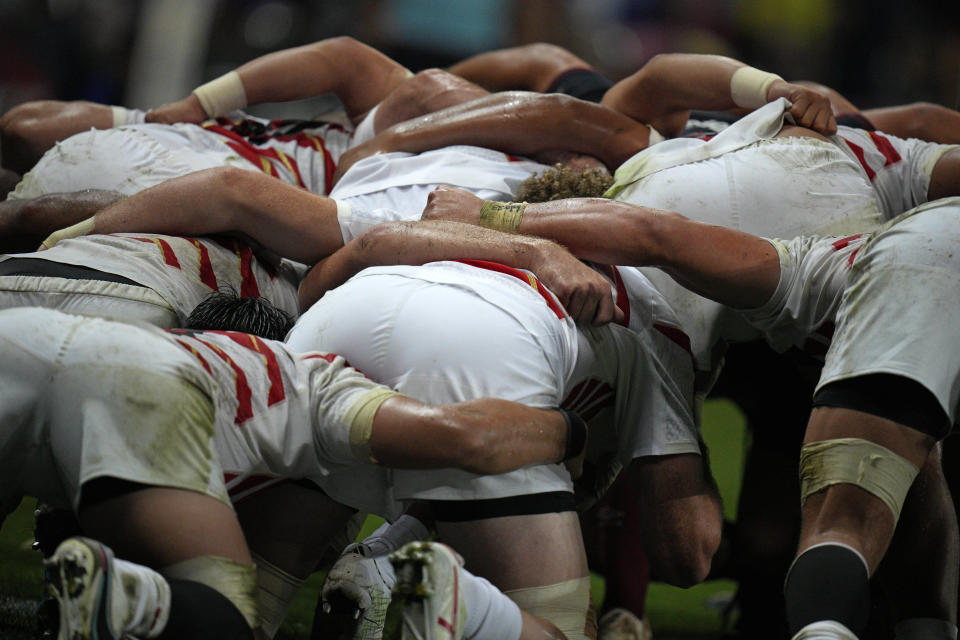 The Japan forward pack get ready for a scrum during the Rugby World Cup Pool D match between England and Japan in the Stade de Nice, in Nice, France Sunday, Sept. 17, 2023. (AP Photo/Daniel Cole)