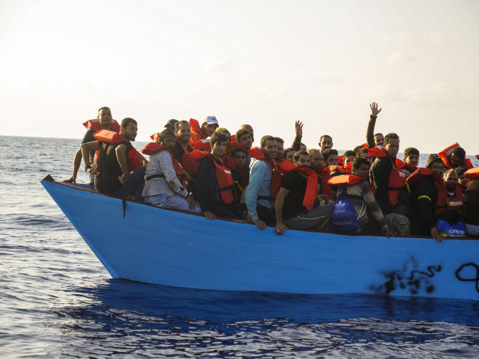 Migrants are rescued from the sea some 30 miles off Libya by the members of the humanitarian ship Geo Barents, Friday, Oct. 6, 2023. Badly advised by relatives and friends, misled by insufficient official information or poor translation services, many can end up in legal limbo for years, cut off from any government aid. (AP Photo/Paolo Santalucia)