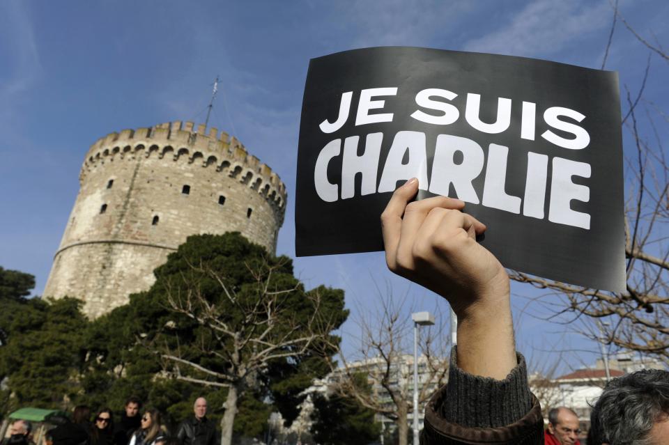 A Greek man holds a placard reading "I am Charlie" as he takes part in a solidarity march in Thessaloniki