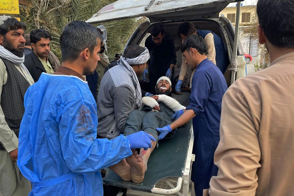 A man, who was injured in the Afghan forces shelling, transport in a hospital, in Chaman, a town in Pakistan's southwestern along Afghan border, Sunday, Dec. 11, 2022. Pakistan's military condemned the "unprovoked and indiscriminate fire" of heavy weapons by Afghan forces on civilians in a border town Sunday, saying some people killed and more than dozen wounded in the incident. (AP Photo)