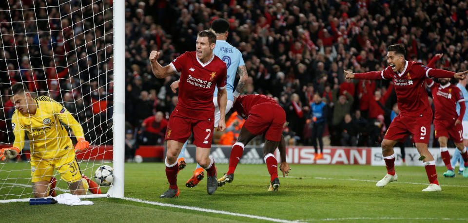 <p>Soccer Football – Champions League Quarter Final First Leg – Liverpool vs Manchester City – Anfield, Liverpool, Britain – April 4, 2018 Liverpool’s James Milner and Roberto Firmino celebrate after Sadio Mane scored their third goal REUTERS/Andrew Yates </p>