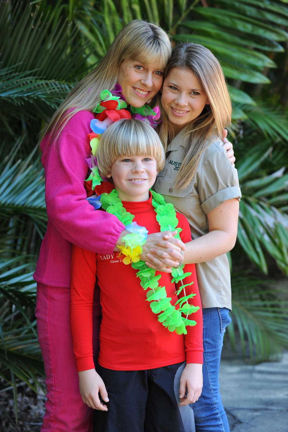 In this handout photo provided by Australia Zoo, Bindi Irwin celebrates her 15th birthday with her mother Terri Irwin and brother Robert Irwin, on July 24, 2013 in Beerwah, Australia. (Photo by Ben Beaden/Australia Zoo via Getty Images)