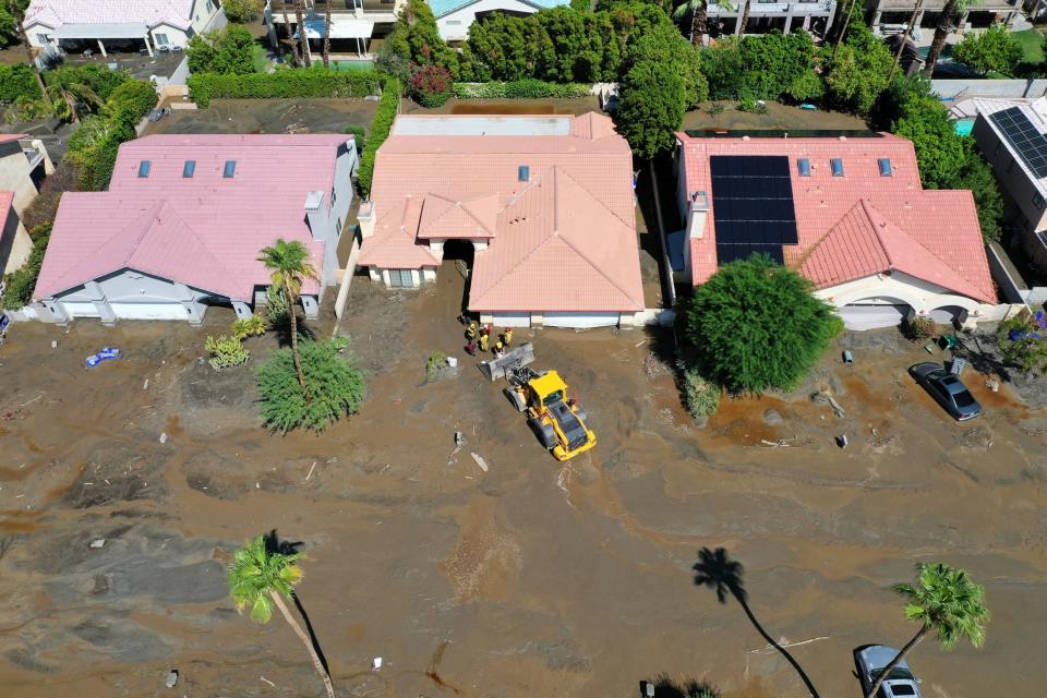 Cathedral City Fire firefighters rescue residents of an elderly care home after the home on Horizon Drive became inundated with mud from Tropical Storm Hilary on Aug. 21, 2023.