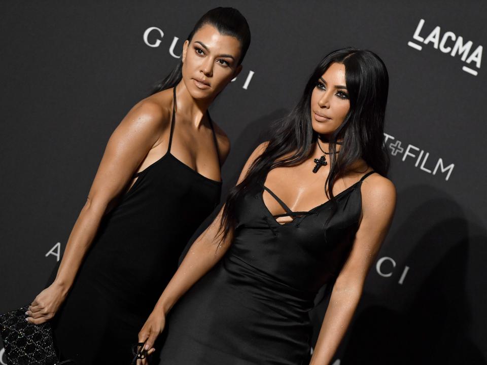 Kourtney Kardashian and Kim Kardashian on November 3, 2018 in Los Angeles, California.