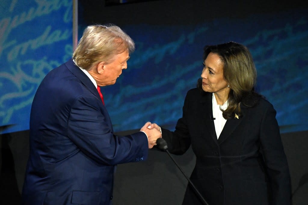 Kamala Harris shakes hands with Donald Trump during the debate. AFP via Getty Images