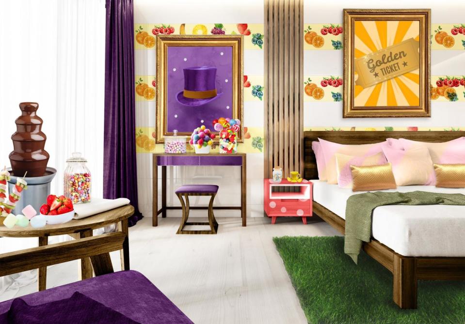 A Willy Wonka-themed hotel room filled with sweets and chocolates.