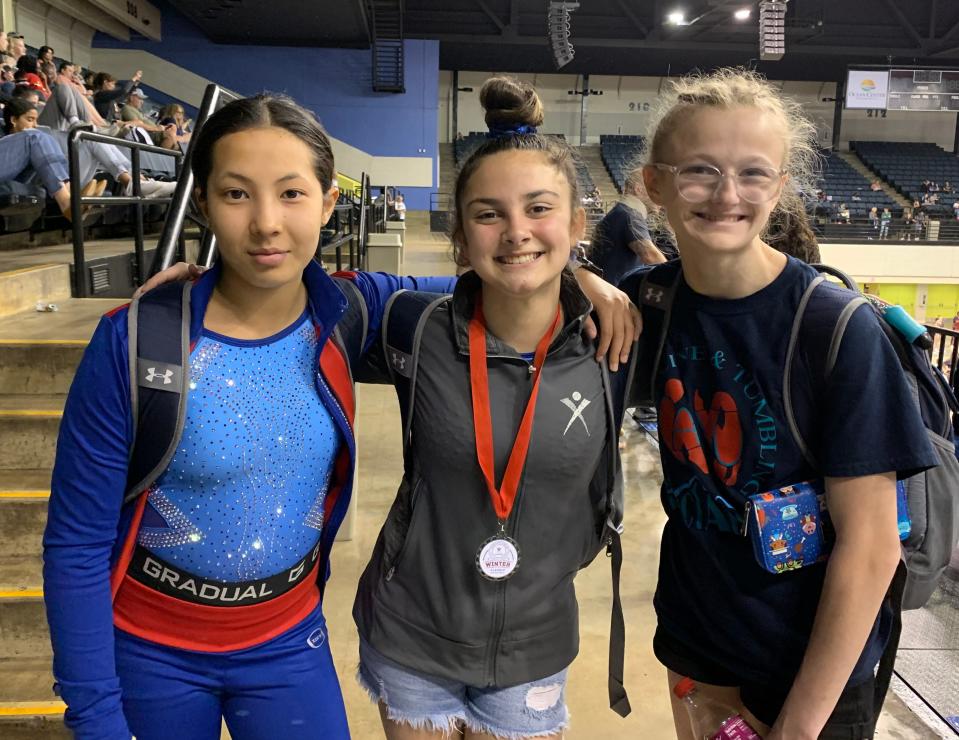 Gabriella “Ella” Vivona is pictured, center, with teammates Julia Tambor and Isabella Filosa.