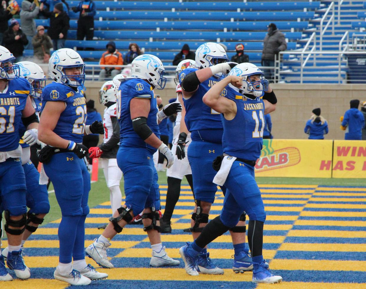 Mark Gronowski celebrates a 2nd quarter touchdown run in SDSU's win over Illinois State.