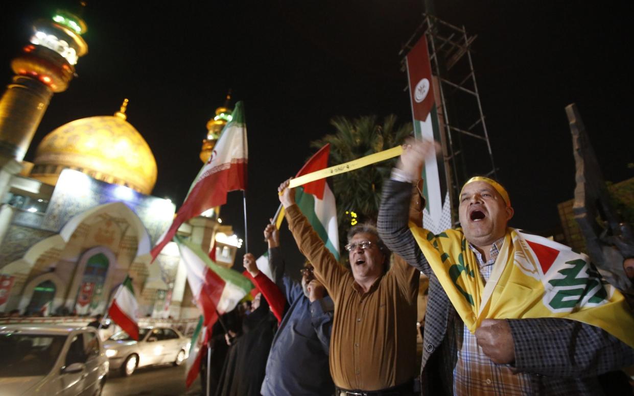 People celebrate in Iran