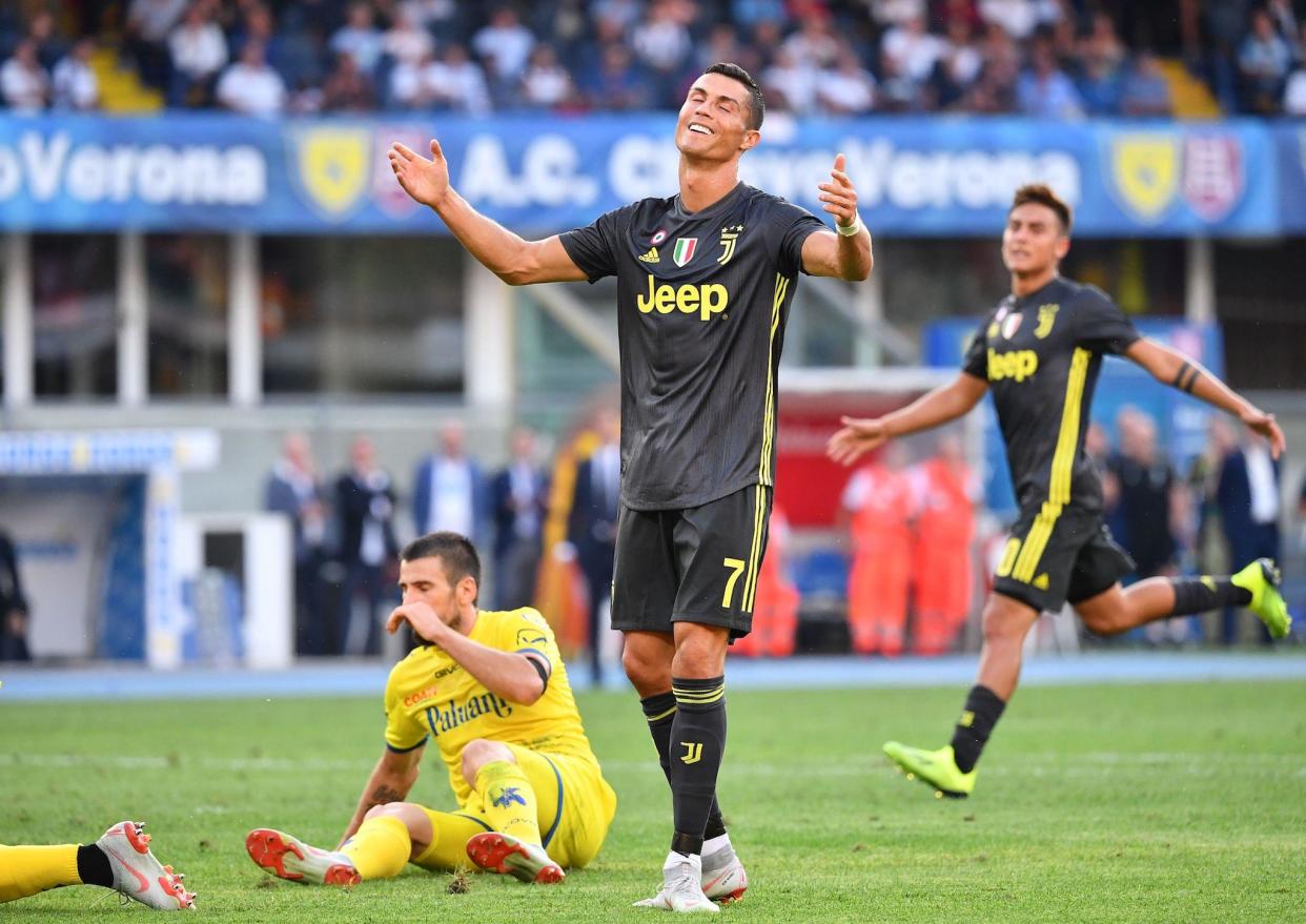 Juventus' Portuguese forward Cristiano Ronaldo reacts after missing a shot during the Italian Serie A football match AC Chievo vs Juventus at the Marcantonio-Bentegodi stadium in Verona on August 18, 2018: ALBERTO PIZZOLI/AFP/Getty Images