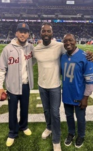 Isiah Thomas with Devin Armani Booker and Calvin Johnson.