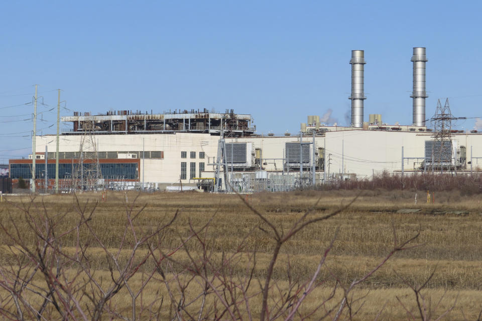 A gas-fired power plant in Linden, N.J., is seen on Feb. 29, 2024. On March 4, 2024, New Jersey lawmakers watered down a proposed referendum on whether to ban construction of new power plants that burn fossil fuels, adding a loophole that allowed for construction of new emergency backup plants that burn fossil fuels. (AP Photo/Wayne Parry)