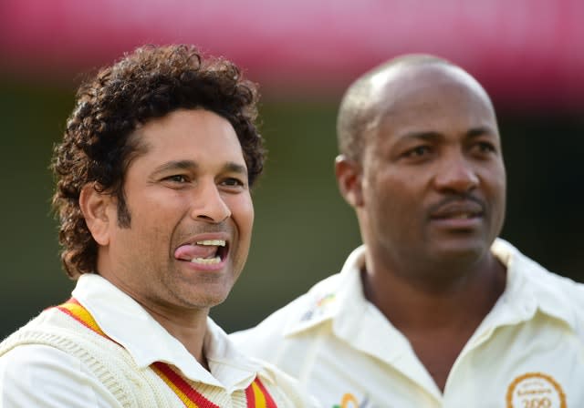 Tendulkar (left) surpassed Brian Lara (right) as cricket's leading Test run-scorer in 2008 (Adam Davy/PA).