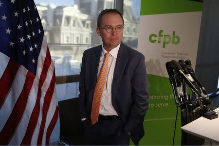 Office of Management and Budget (OMB) Director Mick Mulvaney arrives to speak to the media at the U.S. Consumer Financial Protection Bureau (CFPB), where he began work earlier in the day after being named acting director by U.S. President Donald Trump in Washington November 27, 2017. REUTERS/Joshua Roberts