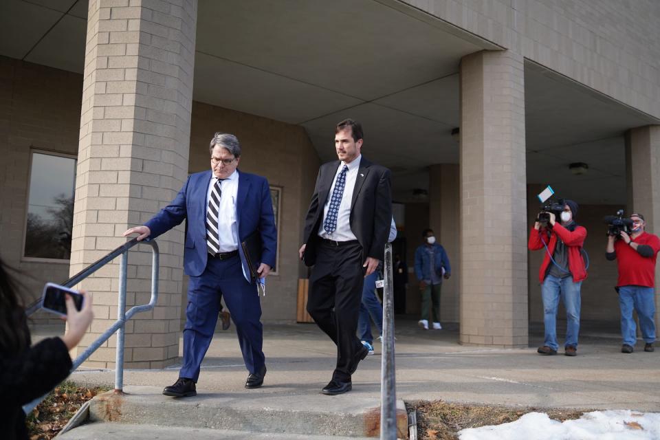 Ex-state health director Nick Lyon exits after making an appearance on a video arraignment at the Genesee County Jail in Flint on Jan. 14, 2021, on new Flint water crisis charges. Charges against Lyon and other former officials were dropped Tuesday, Oct. 4, 2022, after a judge cited a Michigan Supreme Court ruling stating prosecutors erred in having a judge act as a "one-man grand jury" to indict the officials.