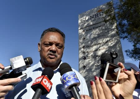 Rev. Jessie Jackson speaks to the media at Sunrise Hospital where ex-NBA player Lamar Odom has been hospitalized in Las Vegas, Nevada October 14, 2015. Odom was reported to be on a respirator and fighting for his life after being found unresponsive at a Nevada brothel. REUTERS/David Becker