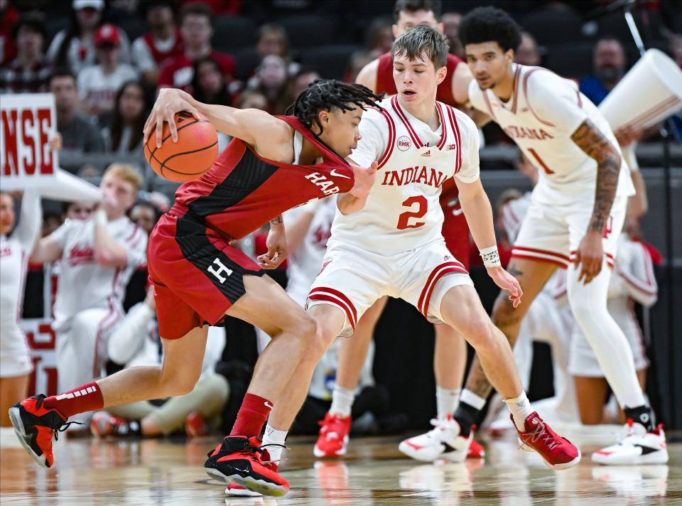 Indiana Hoosiers guard Gabe Cupps (2) defends Harvard Crimson guard Malik Mack (2) during the game against Harvard in Gainbridge Fieldhouse in Indianapolis, Ind. on Sunday, Nob. 26, 2023.