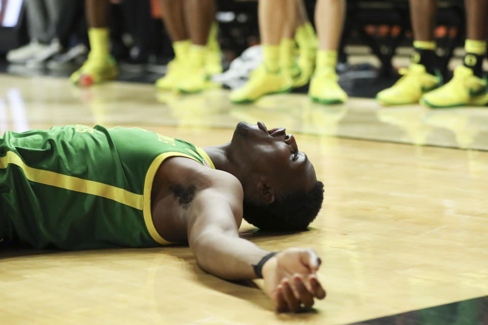 Oregon center N'Faly Dante (1) reacts to a call against Oregon State during the second half of an NCAA college basketball game Saturday, Feb. 17, 2024, in Corvallis, Ore. Oregon won 60-58. (AP Photo/Amanda Loman)
