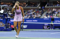 Aryna Sabalenka, of Belarus, reacts to a shot against Iga Swiatek, of Poland, during the semifinals of the U.S. Open tennis championships, Thursday, Sept. 8, 2022, in New York. (AP Photo/John Minchillo)