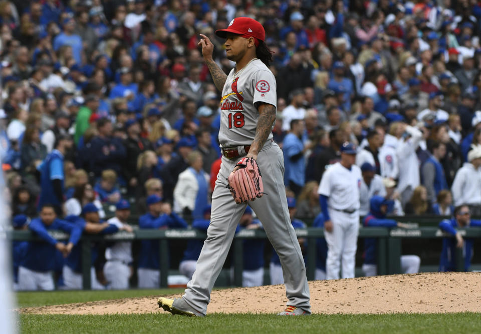 St. Louis Cardinals relief pitcher Carlos Martinez (18) gestures after a baseball game against the Chicago Cubs on Saturday, Sept. 29, 2018, in Chicago. The Cardinals won 2-1. (AP Photo/Matt Marton)