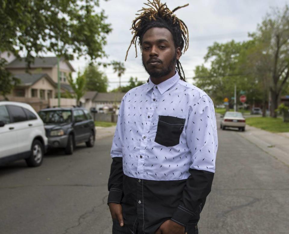 Nandi Cain, photographed in Del Paso Heights in 2017, was stopped and repeatedly punched by an officer after allegedly walking illegally across Grand Avenue on his way home from work. His case was settled for $555,000 from the city.