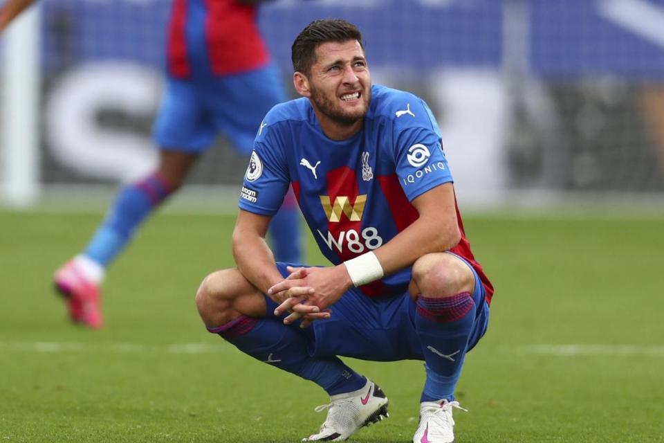 Joel Ward was controversially punished for handball during Crystal Palace's defeat by Everton at Selhurst Park (AP)