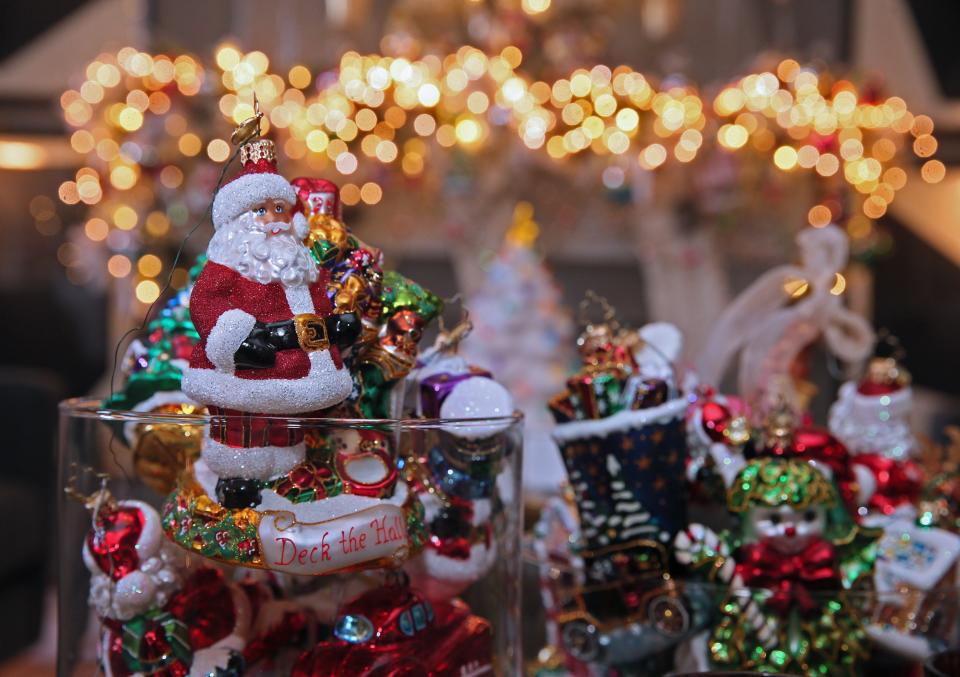 Christopher Radko ornaments that didn’t find a home on the  Christmas tree are displayed in a clear glass container at Mitchell Conklin’s apartment in Milwaukee's Martin Drive neighborhood.