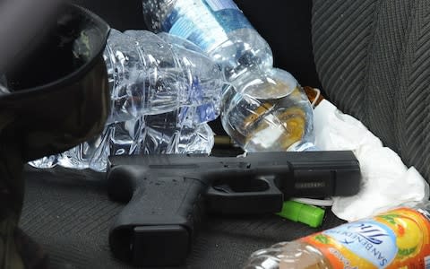 A Glock handgun allegedly used by the gunman in Macerata. - Credit: AFP