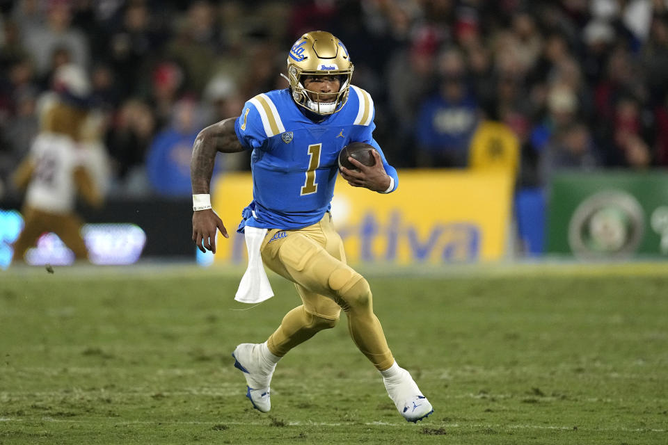 UCLA quarterback Dorian Thompson-Robinson runs the ball during the first half of an NCAA college football game against Arizona Saturday, Nov. 12, 2022, in Pasadena, Calif. (AP Photo/Mark J. Terrill)
