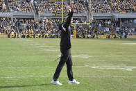 New York Jets head coach Robert Saleh walks onto the field when a call on a run by his running back into the end zone wasn't made during the second half of an NFL football game, Sunday, Oct. 2, 2022, in Pittsburgh. The delayed call resulted in a Jets touchdown. The Jets won 24-20. (AP Photo/Don Wright)