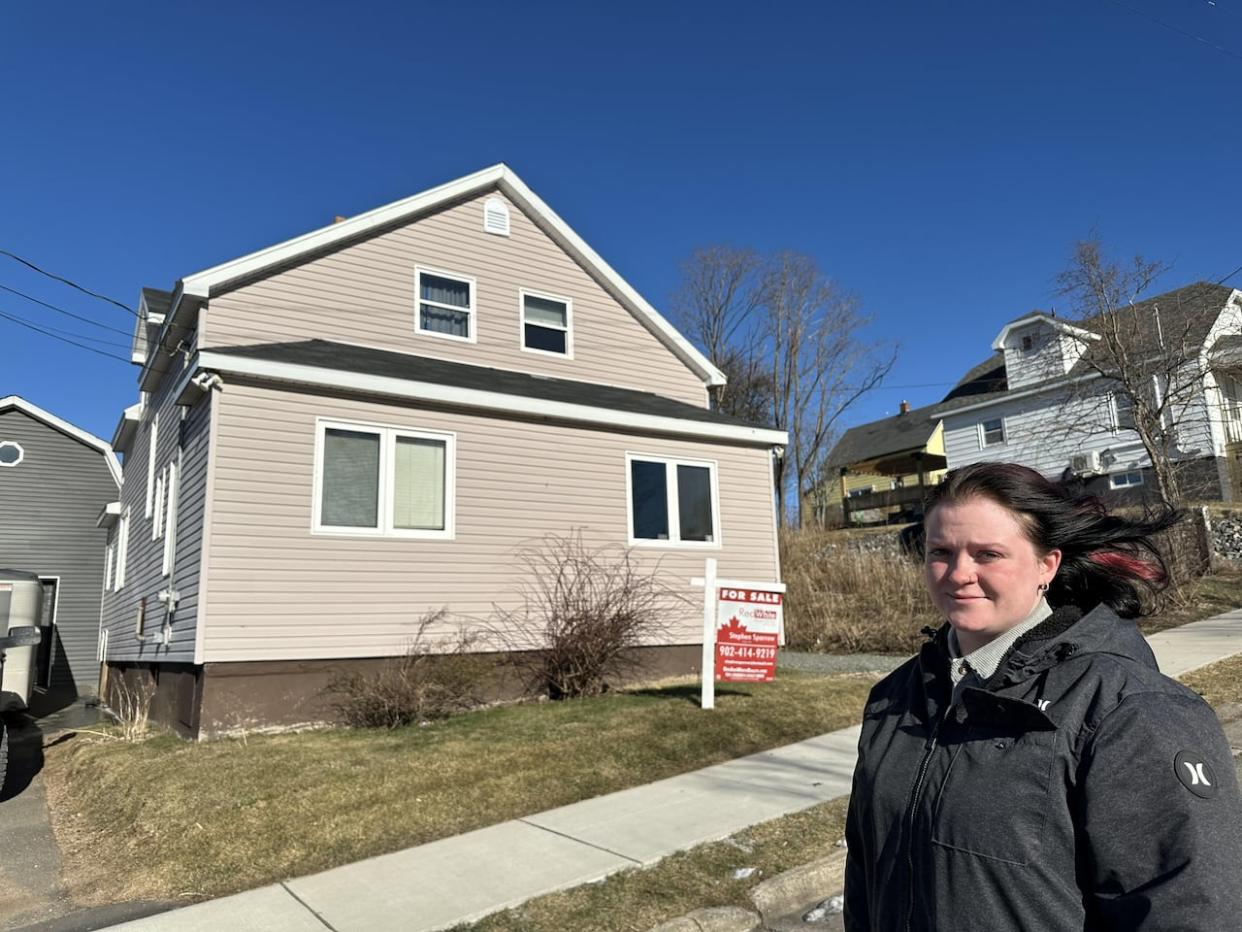 Liv Howard says a conditional sale of her home fell through after the province announced a shelter village for the neighbourhood. (Holly Conners/CBC - image credit)