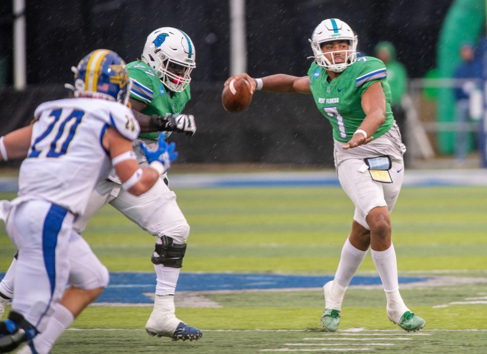 West Florida quarterback Byron Jarrett  throws down field during first round of the 2022 NCAA Division II Football Championship against the Limestone Saints at Pen Air Field Saturday, November 19, 2022.. West Florida went on to beat Limestone 45-19.