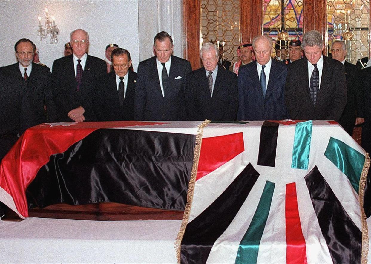 From right, President Bill Clinton; and former Presidents Gerald Ford, Jimmy Carter and George H. W. Bush pay their respects to King Hussein in front of his coffin in the throne room of the Raghadan Palace on Feb. 8, 1999, in Amman, Jordan. Kings, presidents, sheikhs and sultans from around the world attended the state funeral of the 63-year-old Hashemite monarch, who died on Feb. 7, 1999, in Amman.